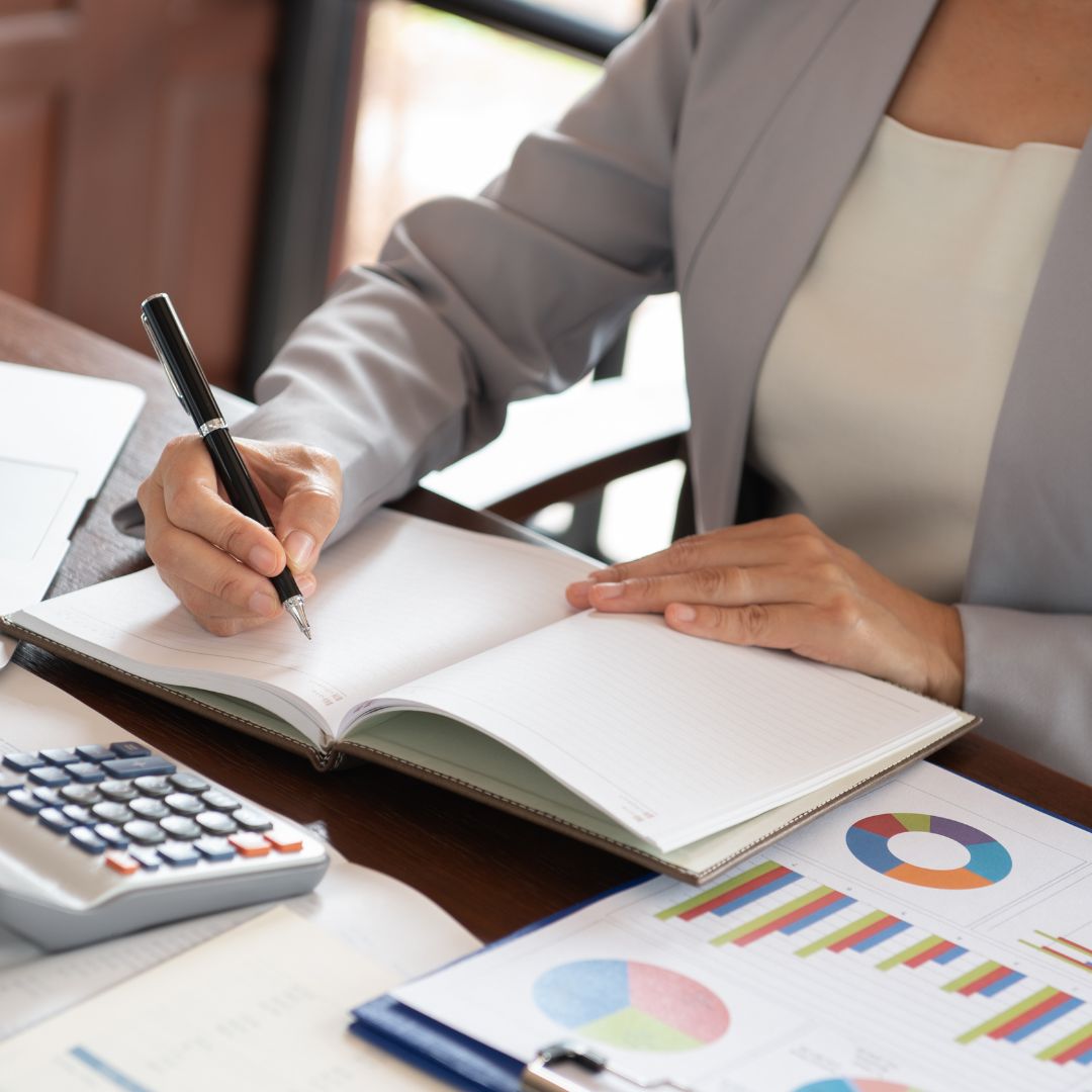photo of a woman reviewing finances