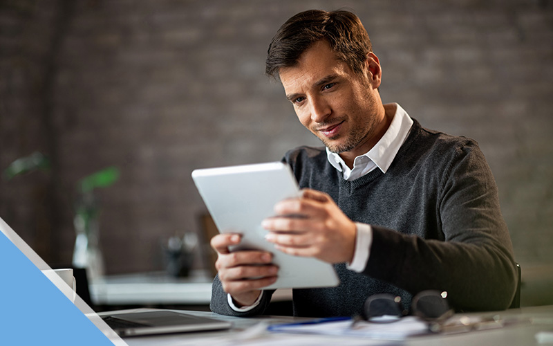 HOA Finnacial Managment Software Image image of a man using an iPad