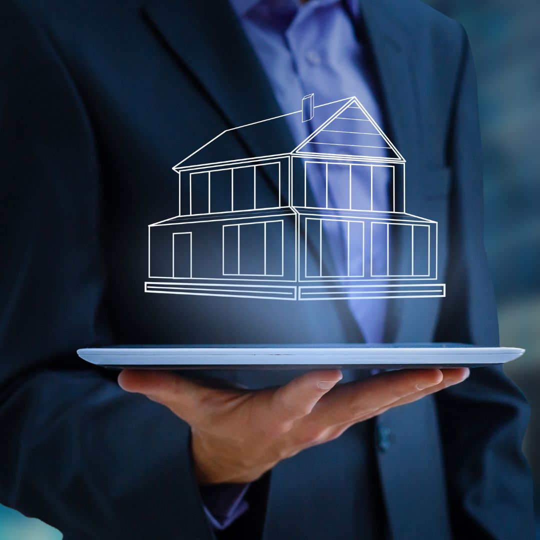 icon of a house floating over a businessman's hands