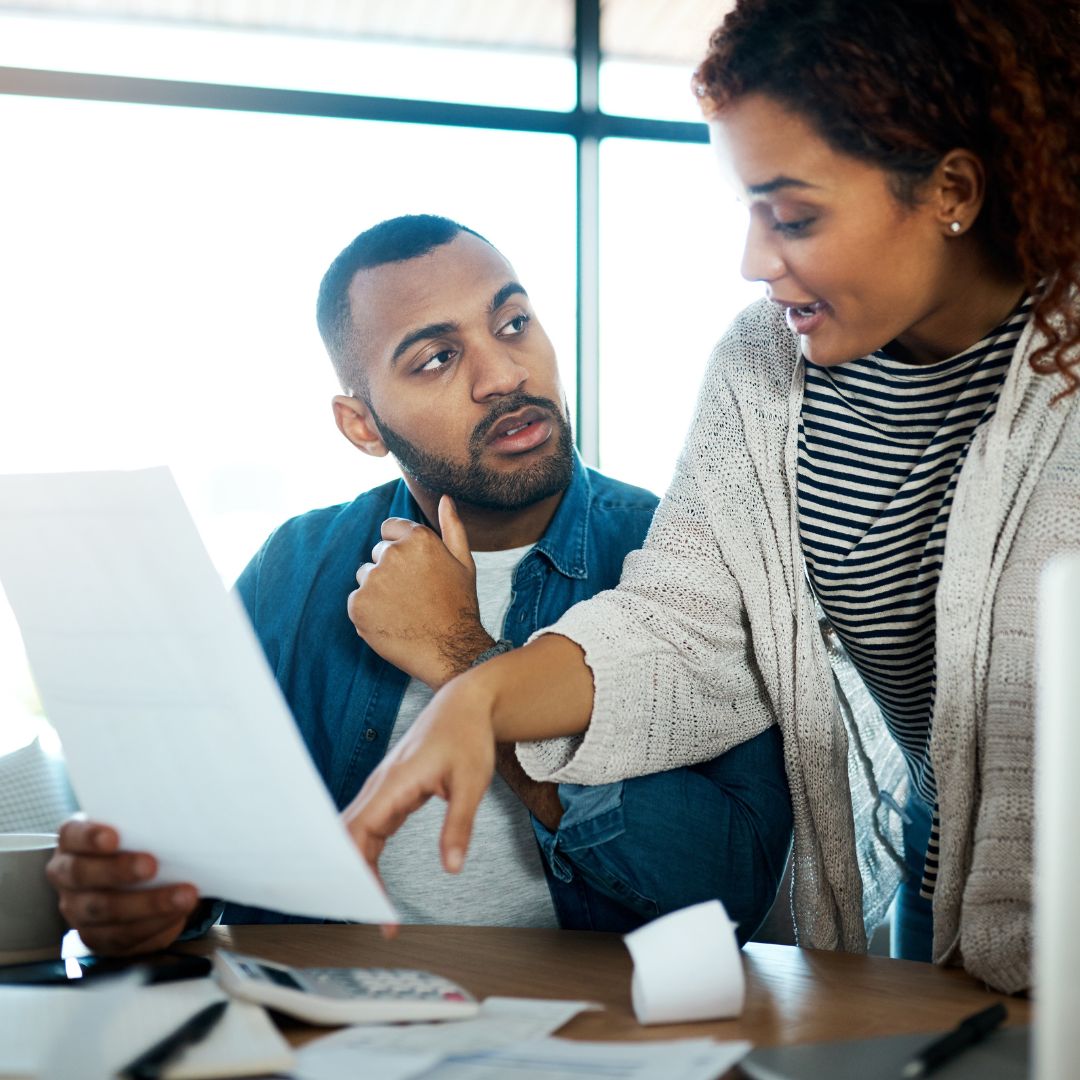 two business people looking at computer
