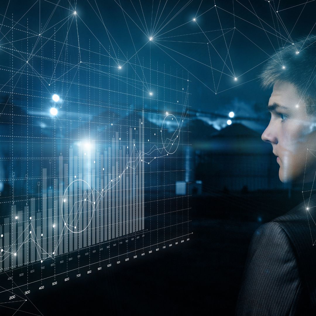 man looking at a money graph 