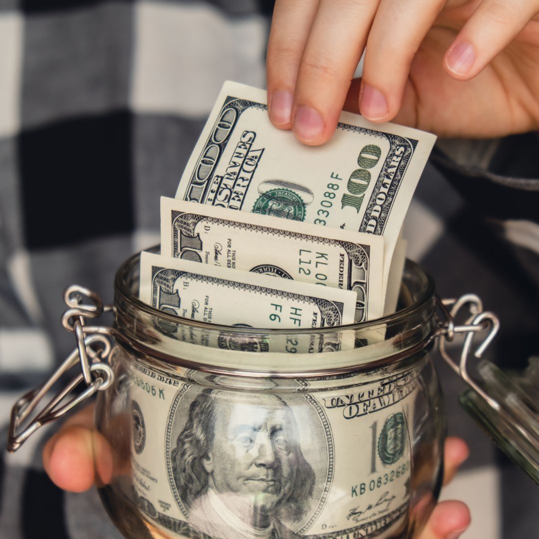 collecting and saving money in a jar 
