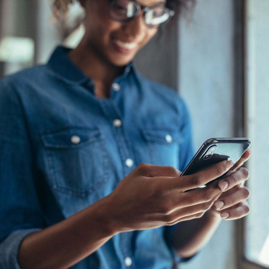 1 img of a woman looking at a phone